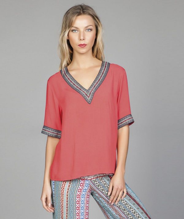 Blusa com...