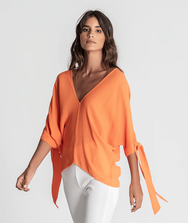Blusa atilhos nas...